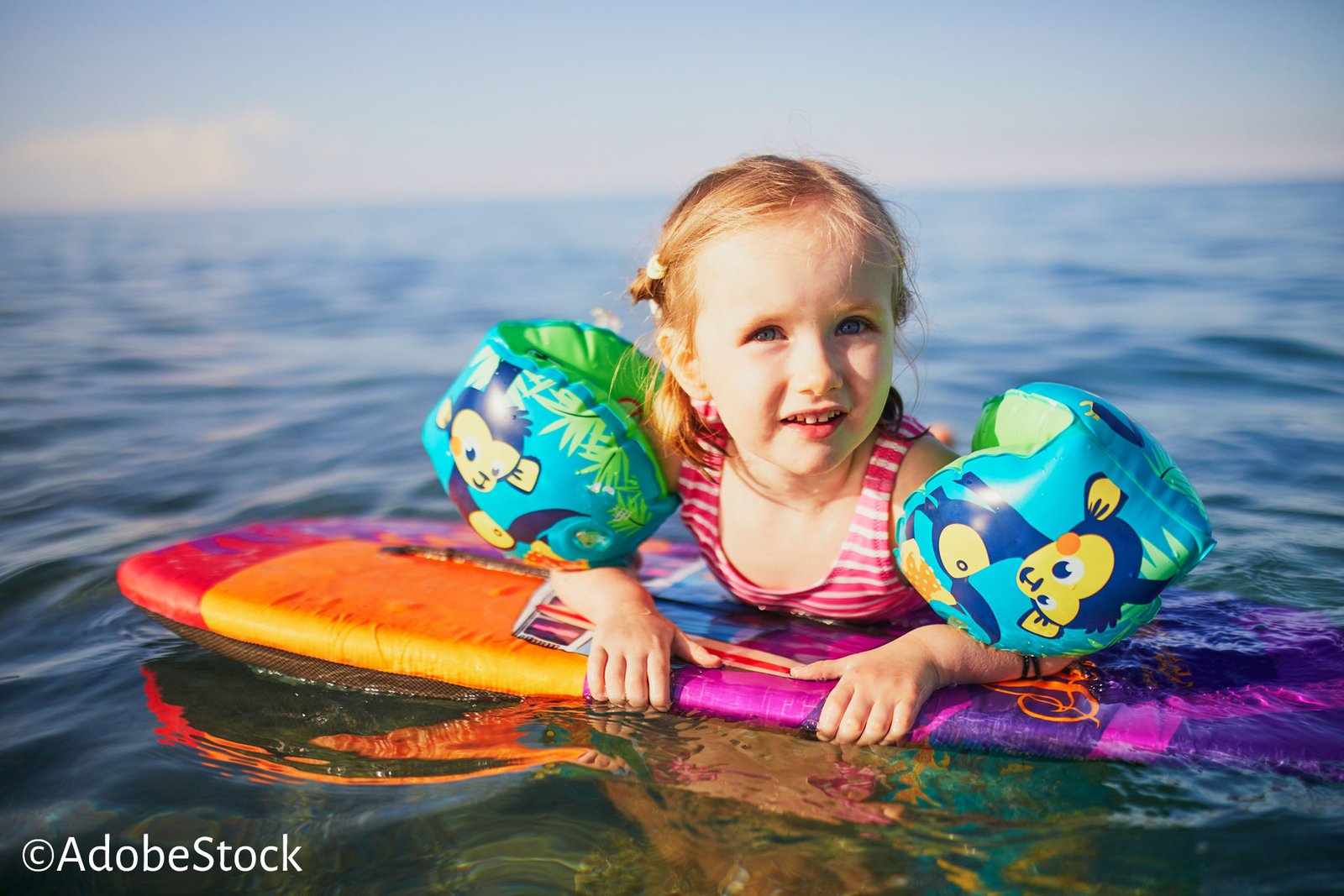 Kid with Floaties AdobeStock